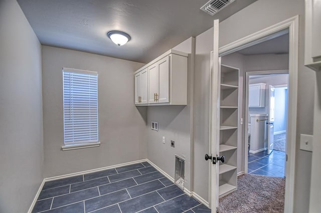 washroom with dark carpet, cabinets, hookup for a washing machine, and hookup for an electric dryer