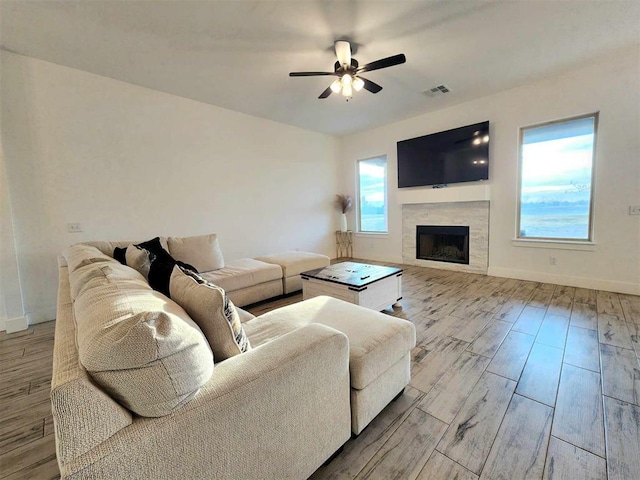 living room featuring ceiling fan