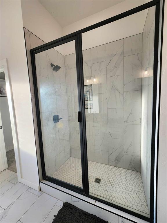 bathroom featuring walk in shower