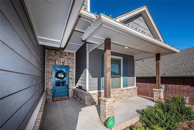 entrance to property with covered porch