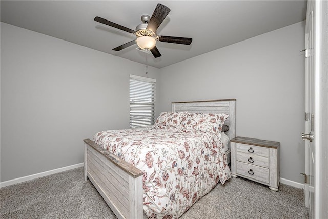 bedroom featuring ceiling fan and light carpet