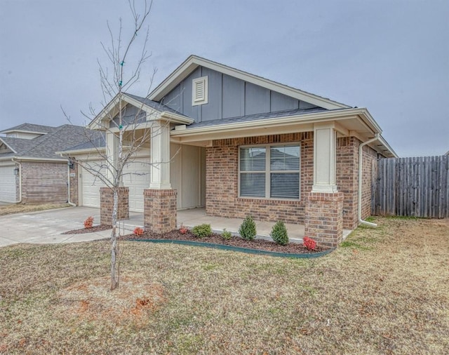 view of front facade with a garage and a front yard