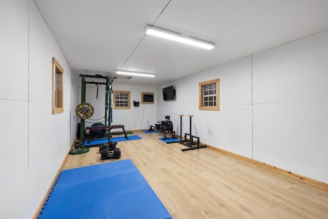 exercise area with hardwood / wood-style flooring