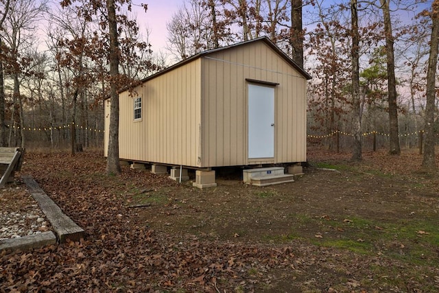 view of outdoor structure at dusk