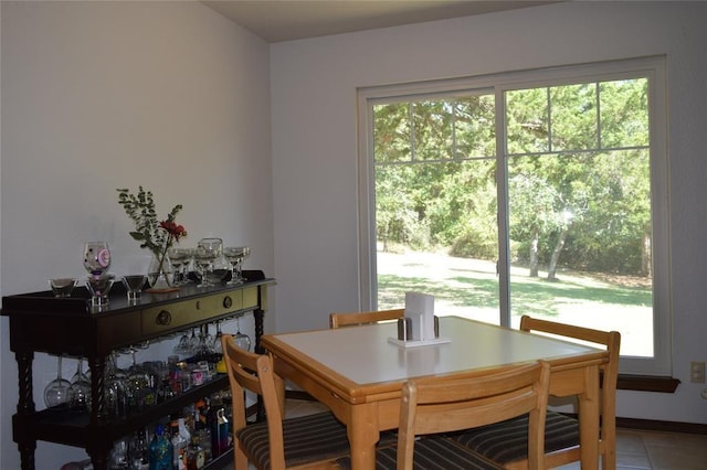 dining room featuring tile patterned flooring