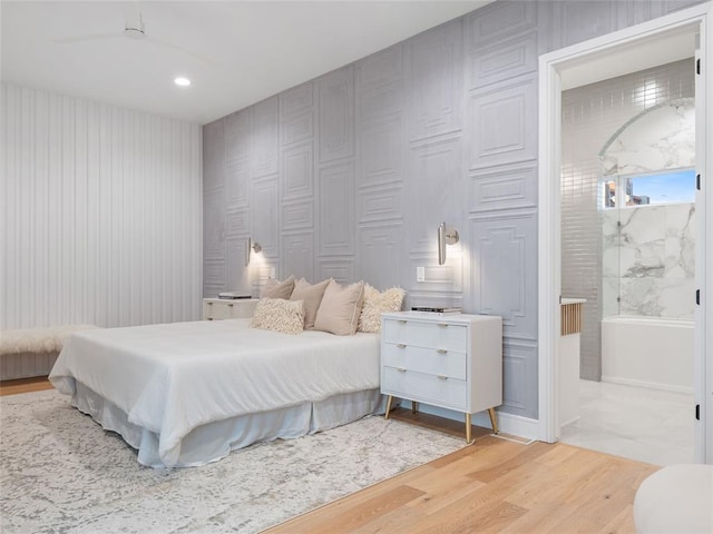 bedroom with light hardwood / wood-style flooring