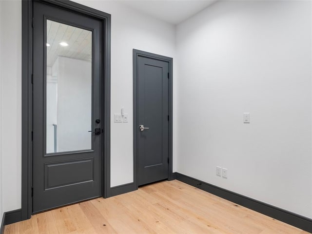 doorway featuring wood-type flooring