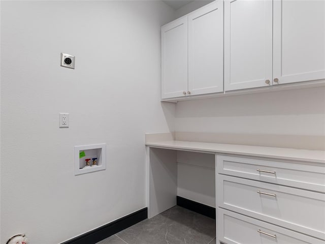 washroom with cabinets, washer hookup, tile patterned floors, and hookup for an electric dryer