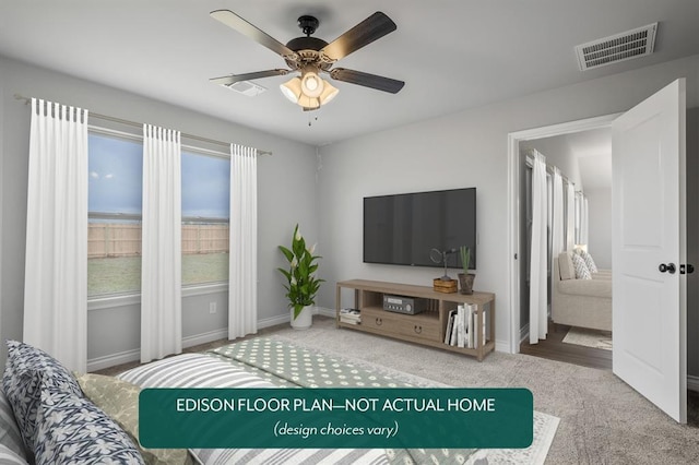 carpeted living room with ceiling fan