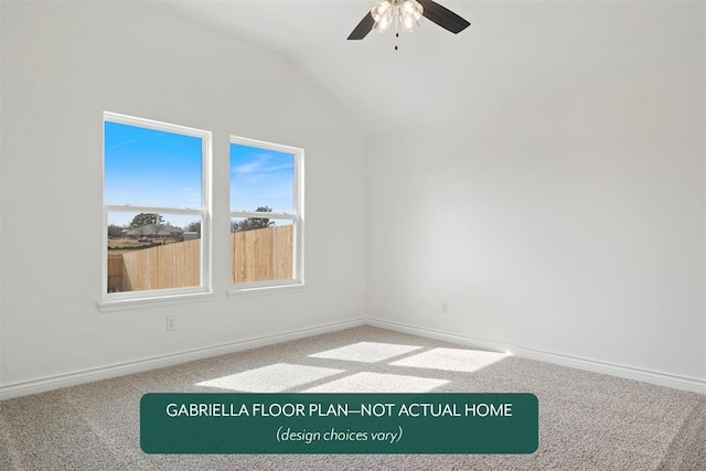 carpeted spare room with ceiling fan and vaulted ceiling