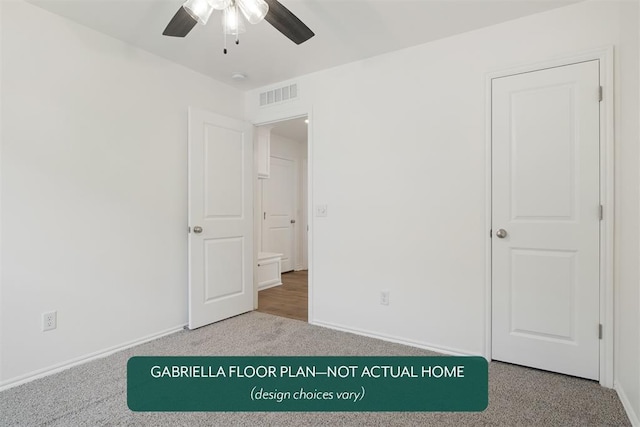 unfurnished bedroom featuring carpet flooring and ceiling fan