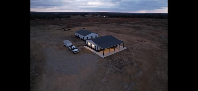 aerial view at dusk with a rural view