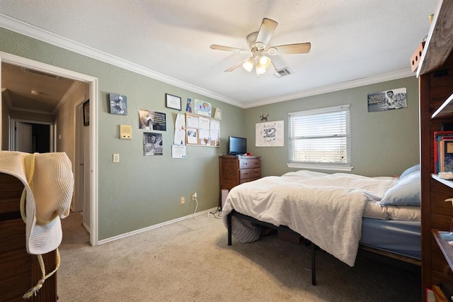 bedroom featuring carpet flooring, ceiling fan, and ornamental molding