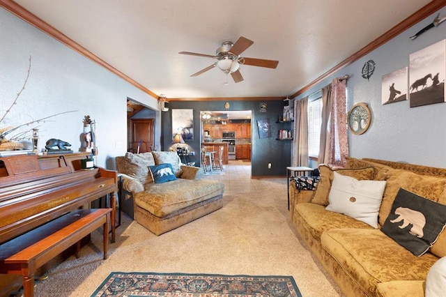 carpeted living room featuring ceiling fan and ornamental molding