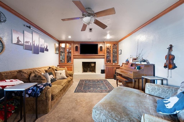carpeted living room featuring crown molding and ceiling fan