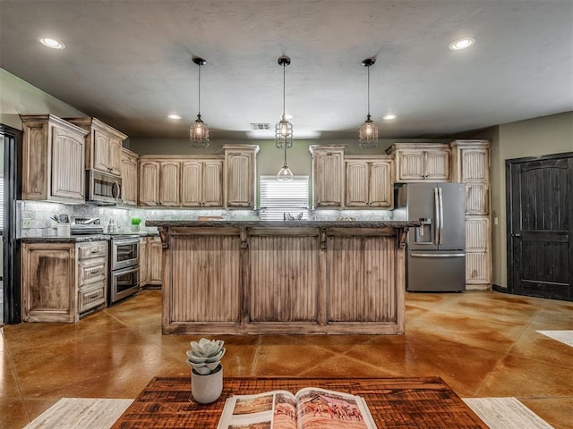 kitchen with backsplash, hanging light fixtures, a kitchen island, and stainless steel appliances