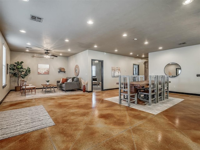 dining room with baseboards, finished concrete floors, visible vents, and recessed lighting