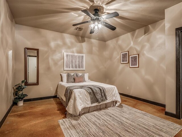 bedroom featuring visible vents, baseboards, and ceiling fan