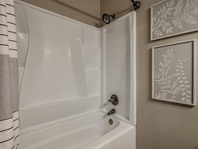 full bathroom featuring shower / bathtub combination with curtain