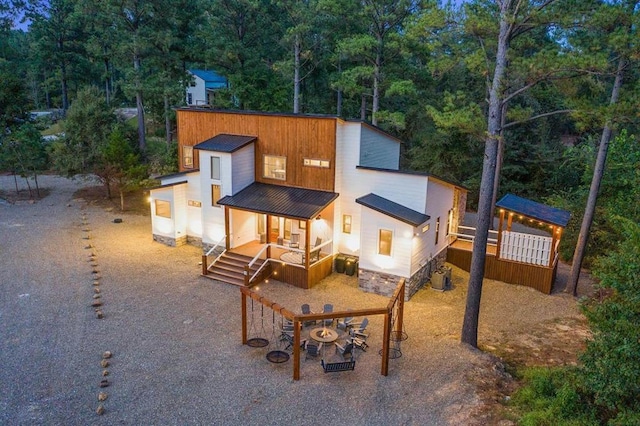 view of front of property with central AC unit