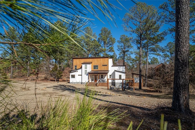 view of front of property with a deck