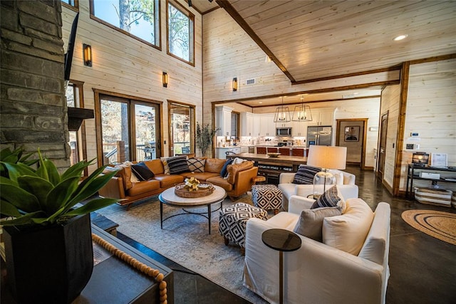 living room with wooden walls, wooden ceiling, high vaulted ceiling, and an inviting chandelier