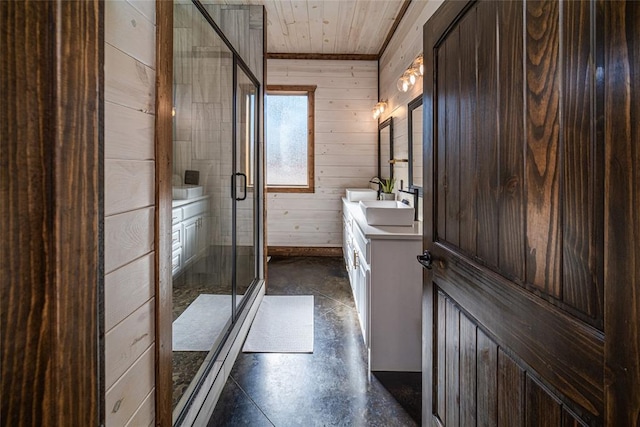 bathroom with vanity, wood walls, wood ceiling, and walk in shower