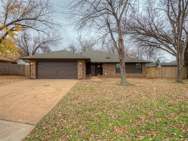 single story home featuring a garage