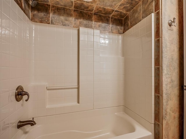 bathroom featuring washtub / shower combination