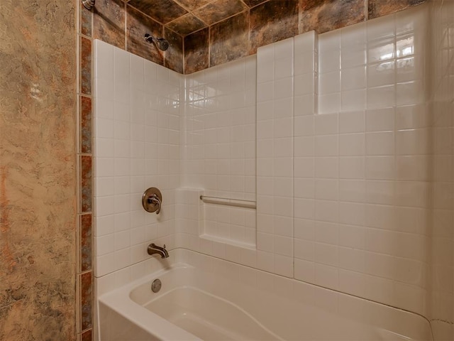 bathroom featuring washtub / shower combination