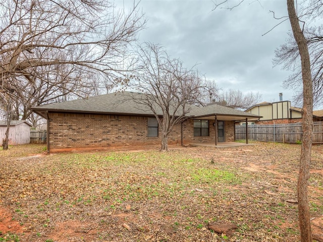 back of house featuring a patio