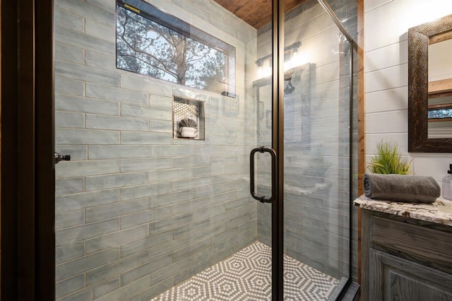 bathroom with vanity and an enclosed shower