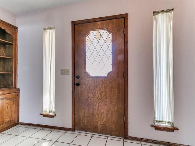 foyer entrance featuring plenty of natural light