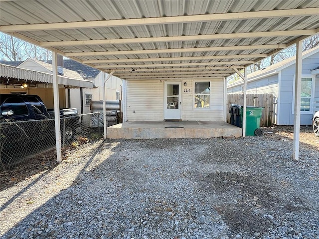 exterior space featuring a carport