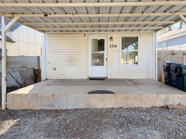 property entrance with a patio