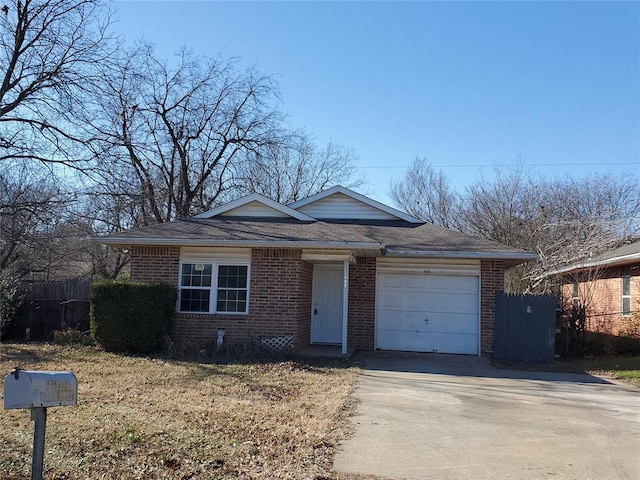 ranch-style house featuring a garage