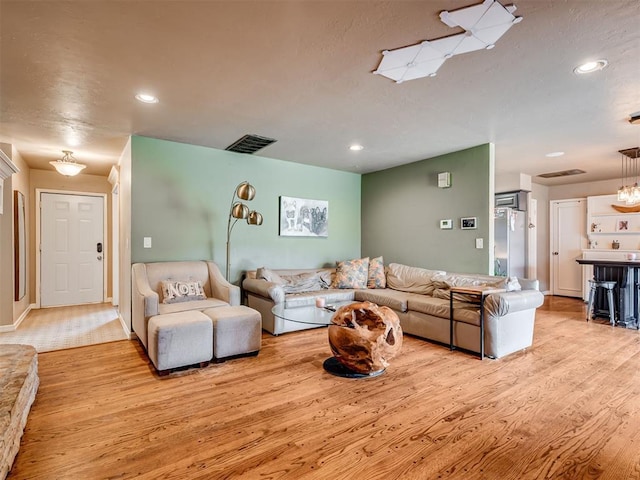 living room featuring light wood-type flooring