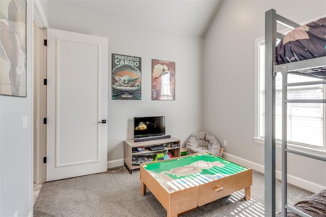 recreation room with carpet and lofted ceiling