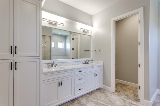 bathroom featuring vanity and walk in shower