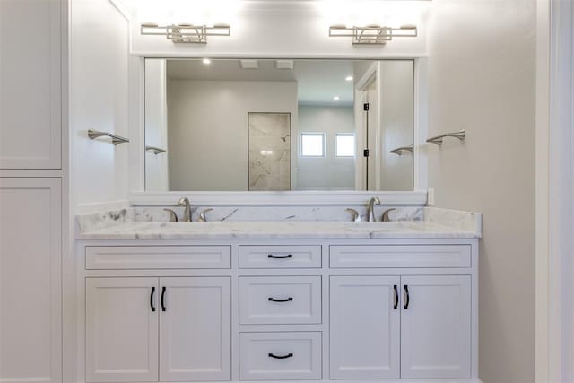 bathroom featuring vanity and walk in shower