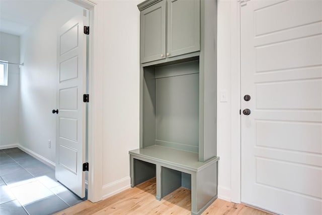 mudroom with light wood-type flooring and baseboards