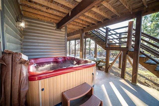 view of patio / terrace featuring a hot tub