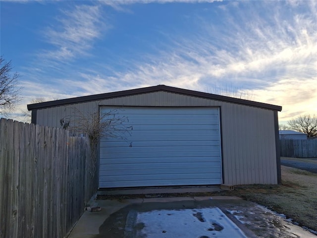 detached garage with fence