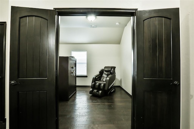 living area with dark wood-type flooring