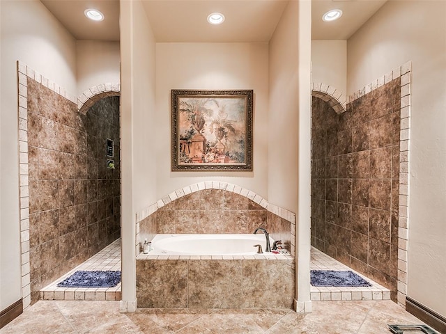 bathroom with independent shower and bath