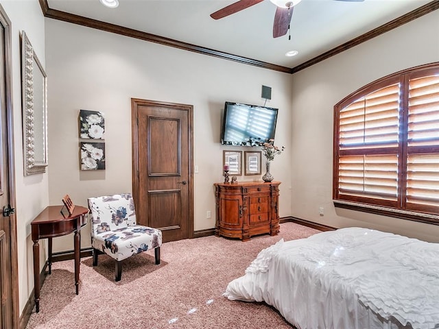 bedroom featuring ceiling fan, ornamental molding, light carpet, and multiple windows