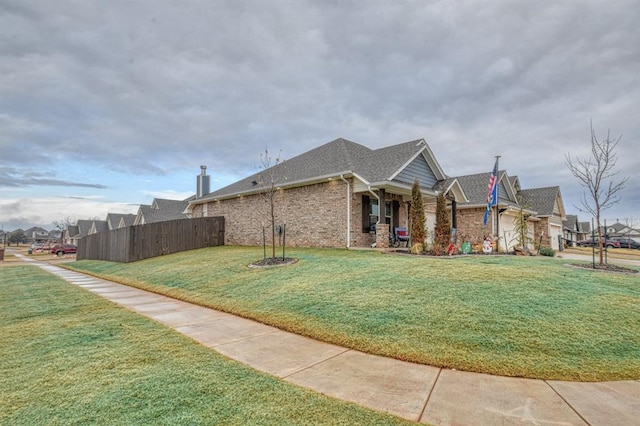 exterior space with a front lawn