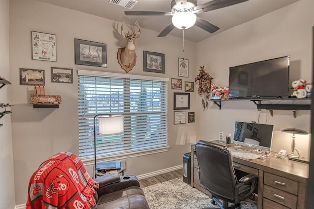 office space with wood-type flooring and ceiling fan