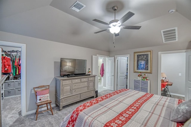 bedroom with light carpet, ceiling fan, and lofted ceiling