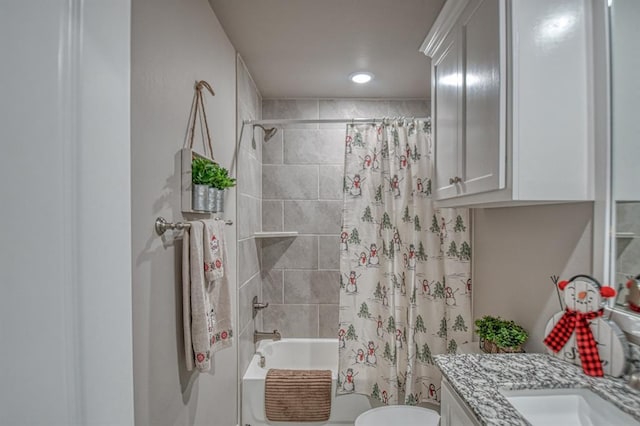 full bathroom with vanity, toilet, and shower / bath combo with shower curtain